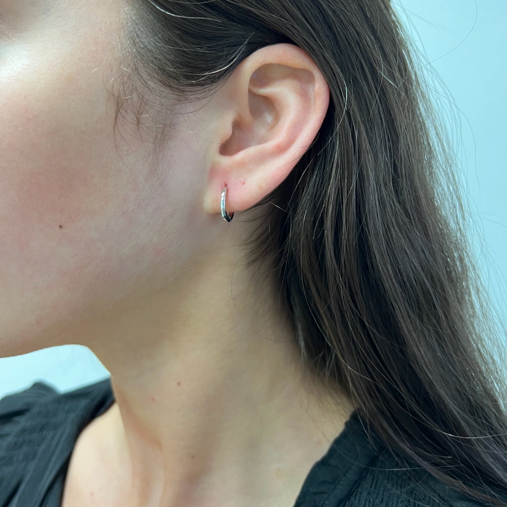 DFJ 14 Karat White Gold Huggie Earrings