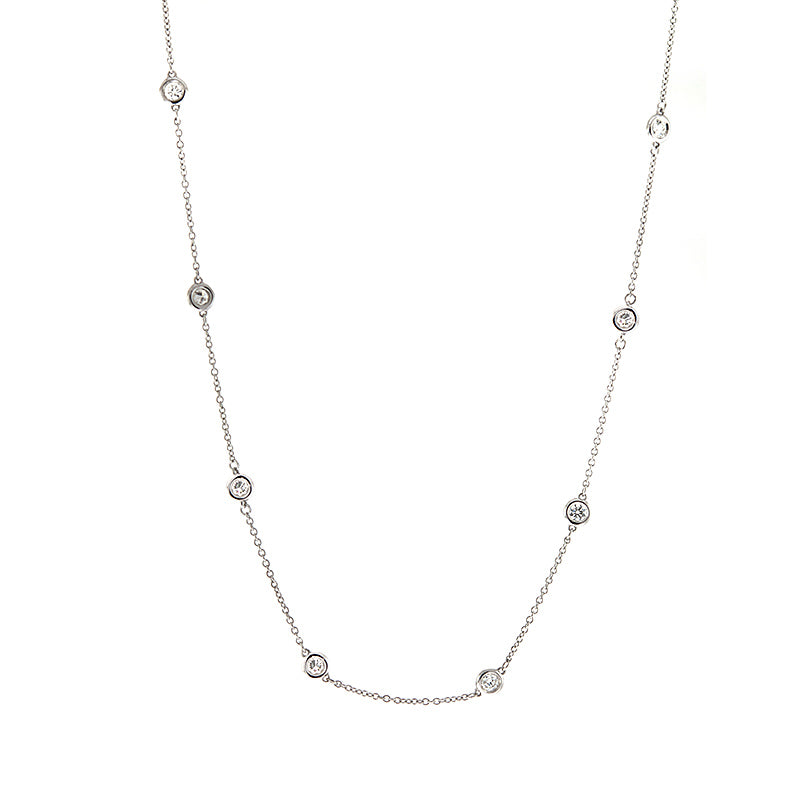 DFJ 14 Karat White Gold Diamond Station Necklace - 0.78TWT