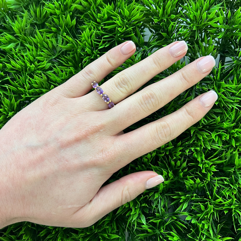 DFJ 18 Karat Yellow Gold  Oval Cut Amethyst Eternity Ring
