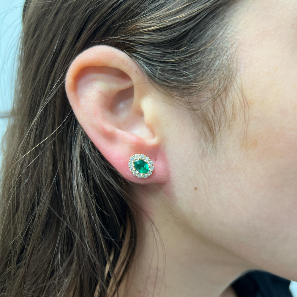 DFJ 18 Karat Yellow Gold Oval Emerald Stud Halo Earrings - 1.18 TWT
