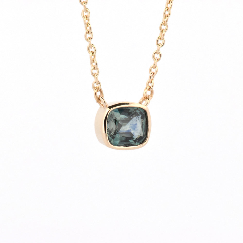 DFJ 14 Karat Yellow Gold Teal Sapphire Bezel Necklace