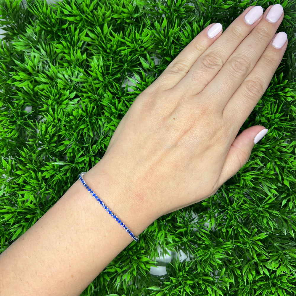 DFJ 14 Karat White Gold Blue Sapphire Tennis Bracelet