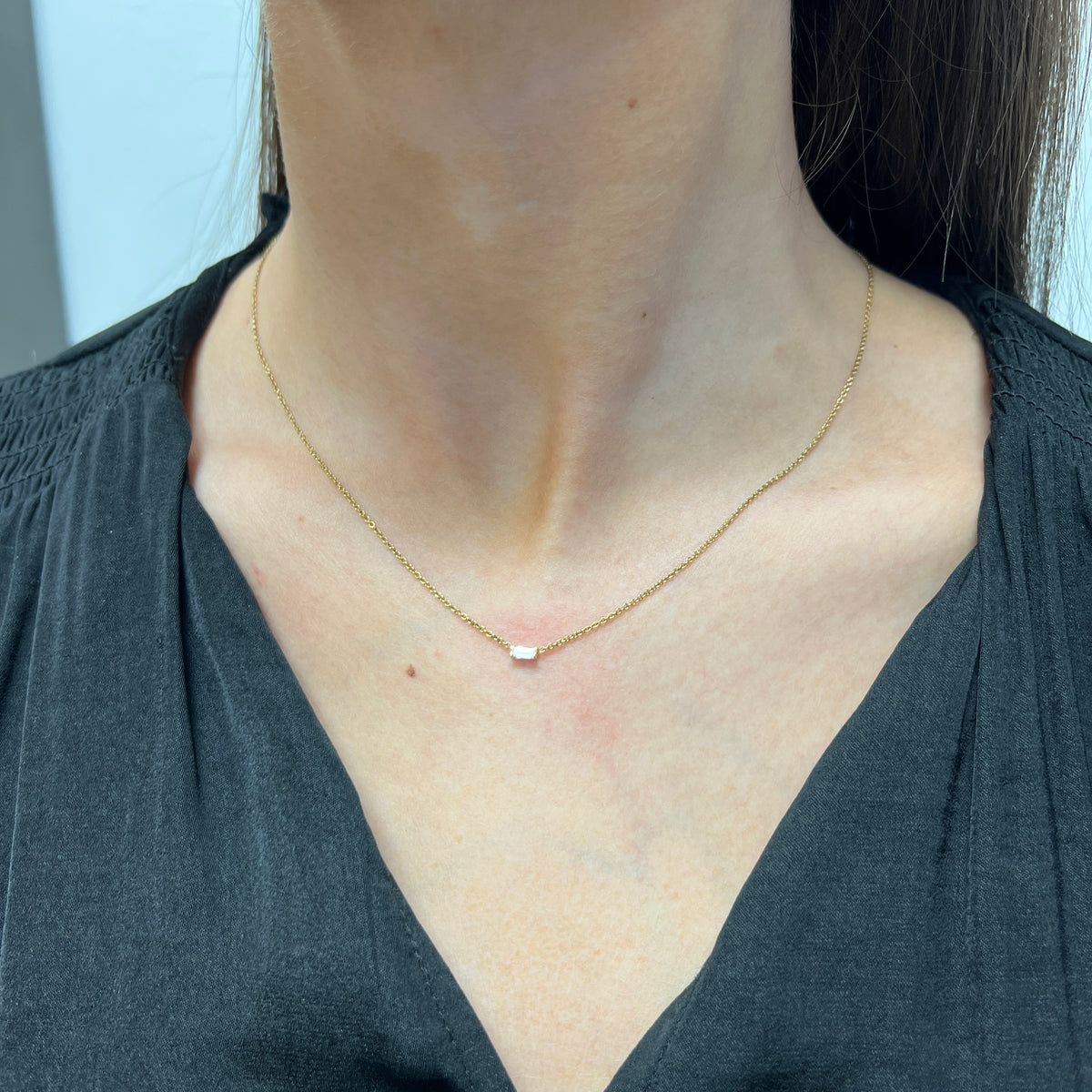 DFJ 14 Karat Yellow Gold Solitaire Baguette Diamond Necklace