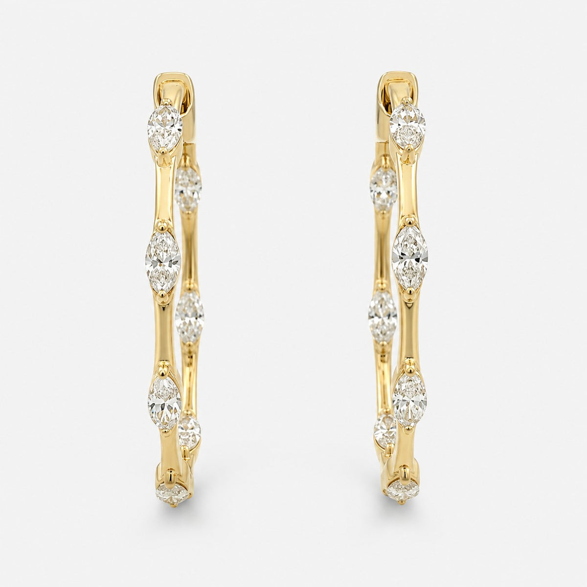 DFJ 18 Karat Yellow Gold Marquise Cut Diamond Medium Hoop Earrings - 1.43TWT