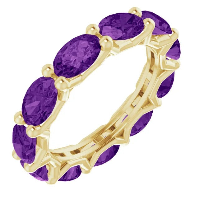 DFJ 18 Karat Yellow Gold  Oval Cut Amethyst Eternity Ring