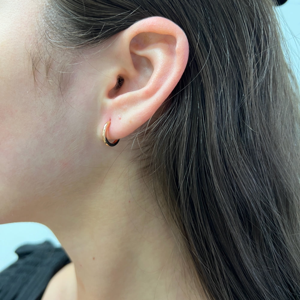 DFJ 14 Karat Rosé Gold Huggies Earrings