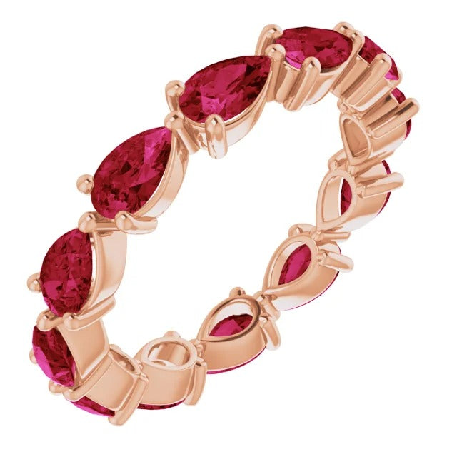 DFJ 14 Karat Rosé Gold Pear Shape Rubiy Eternity Band